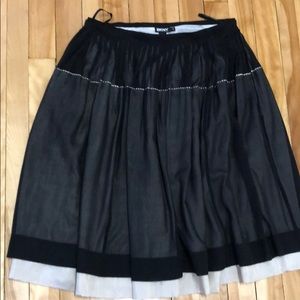 DKNY size 10 black silk skirt. Silk lining.